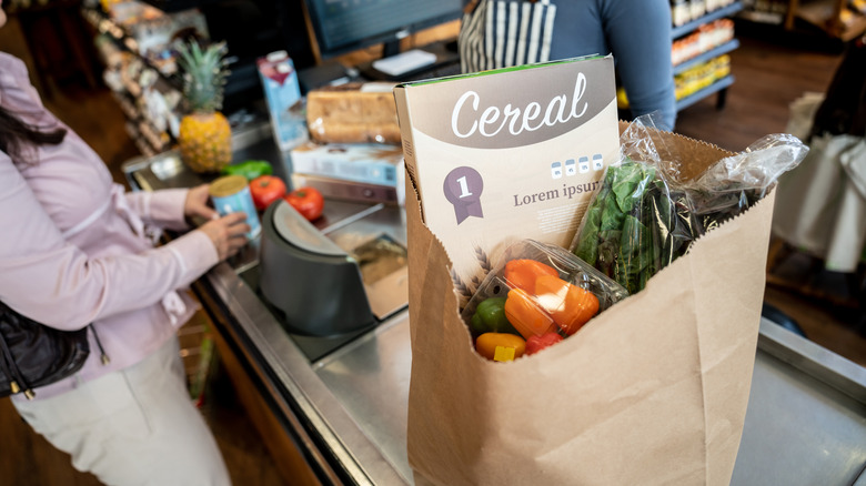 bag of groceries at checkout