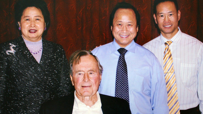 Feorge H.W. Bush with owners of Peking Inn Gourmet