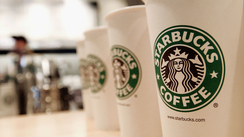 Row of Starbucks cups