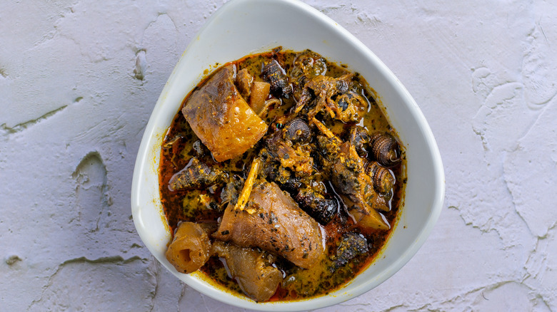 Banga soup in a ceramic bowl