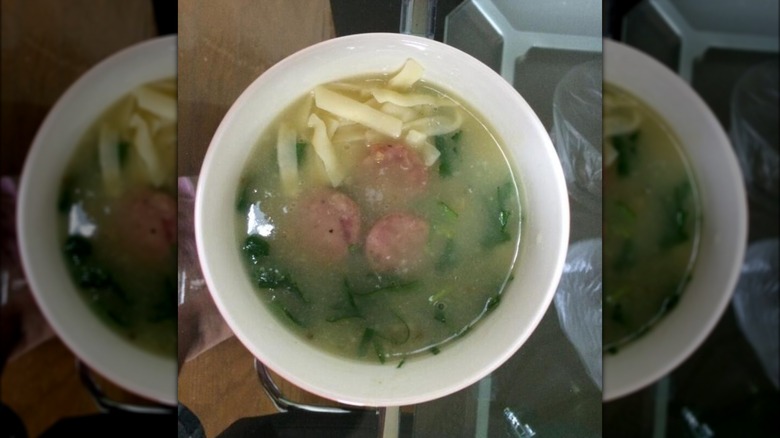 Caldo Verde soup in a white bowl