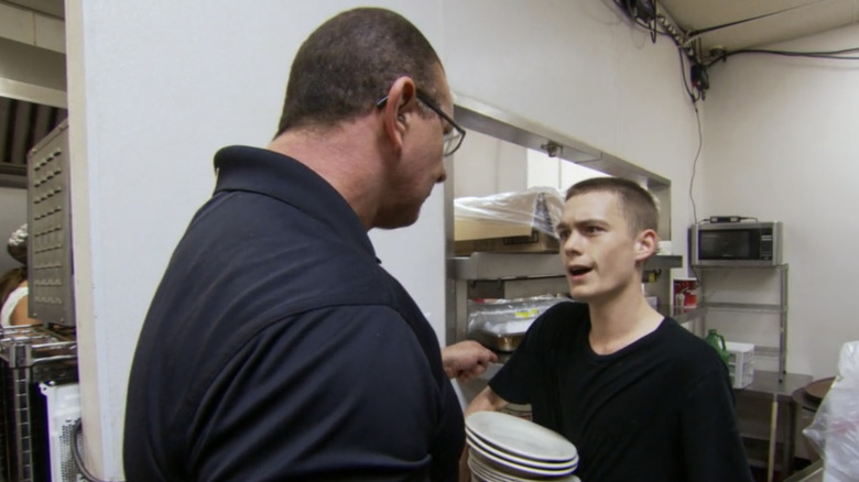 Robert Irvine arguing with employee