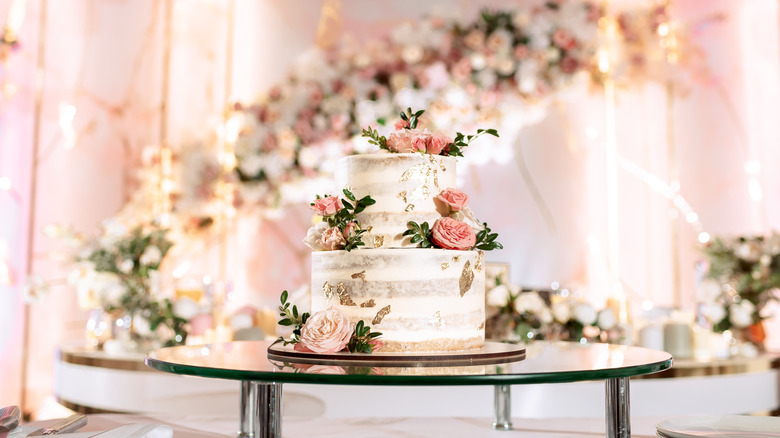 Ornate gold and floral wedding cake