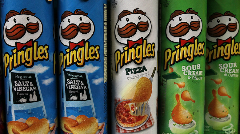 Row of various Pringle cans
