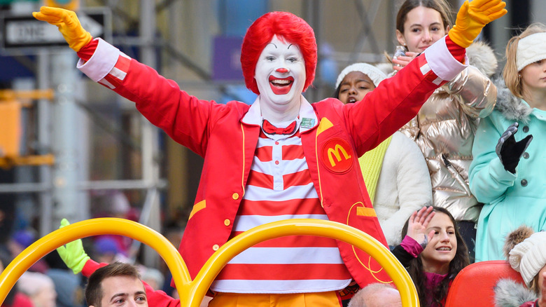 Ronald McDonald waving at parade