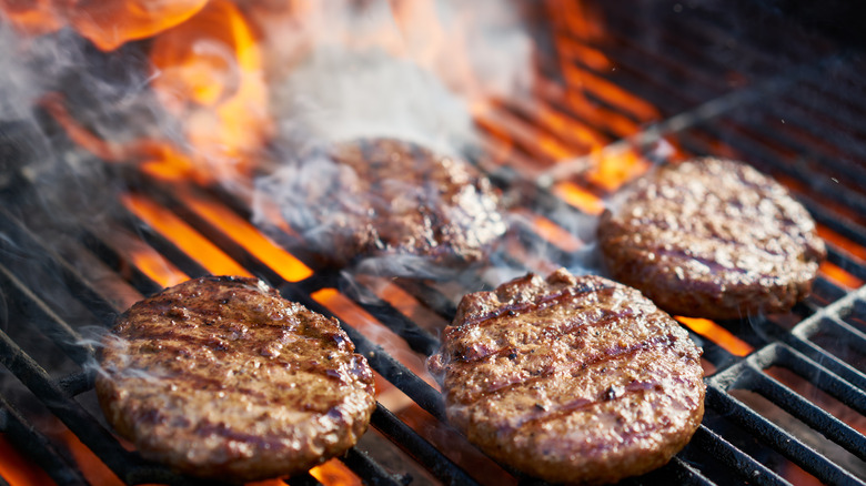 Burgers on smoking grill