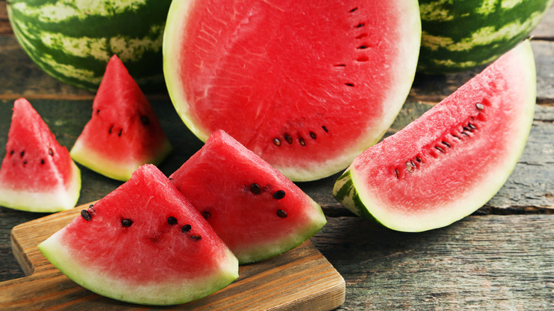 Watermelon sliced on board