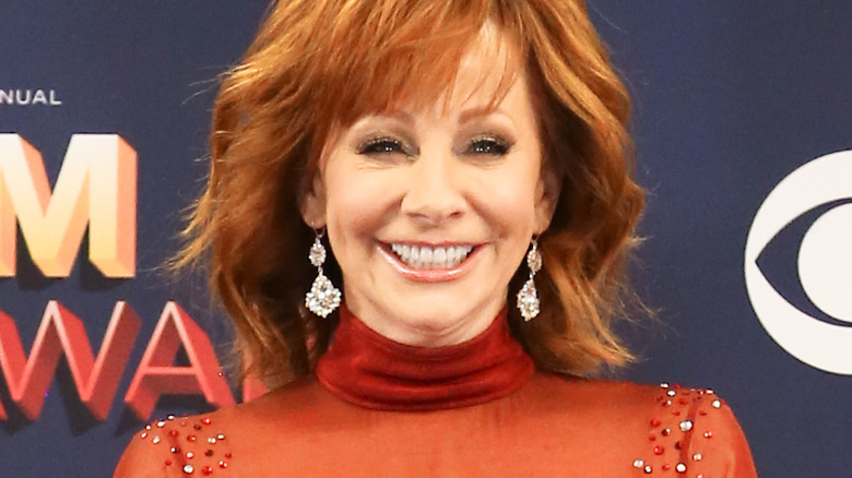 Reba McEntire smiles