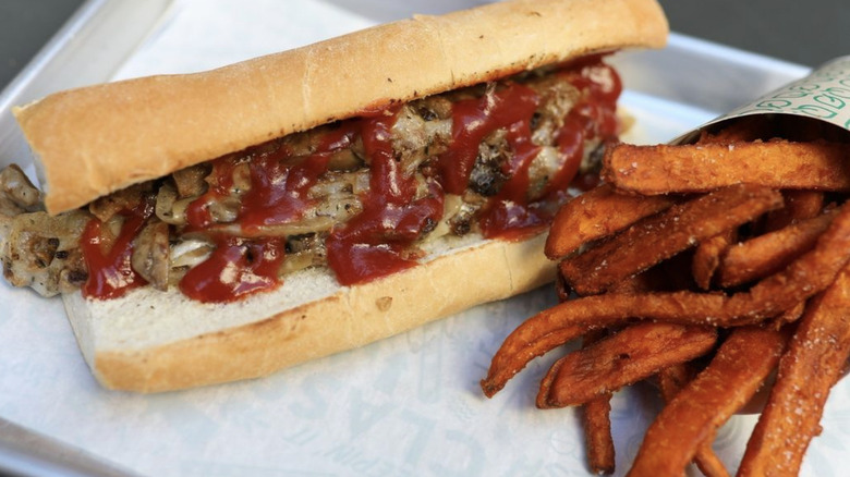 Vegan Philly Cheeseteak with ketchup and fries