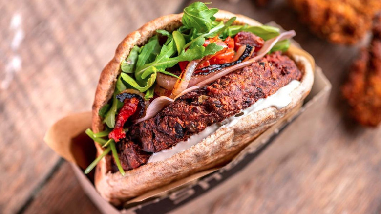 Shouk veggie burger with arugula 