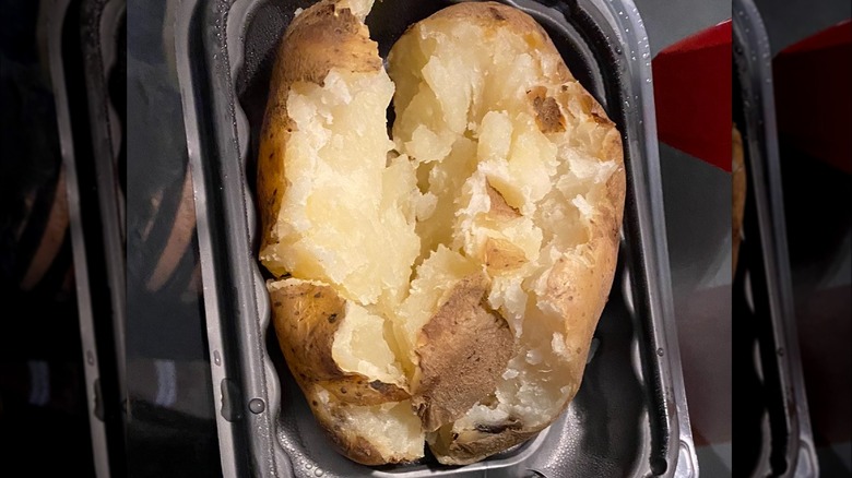 Baked potato sliced open