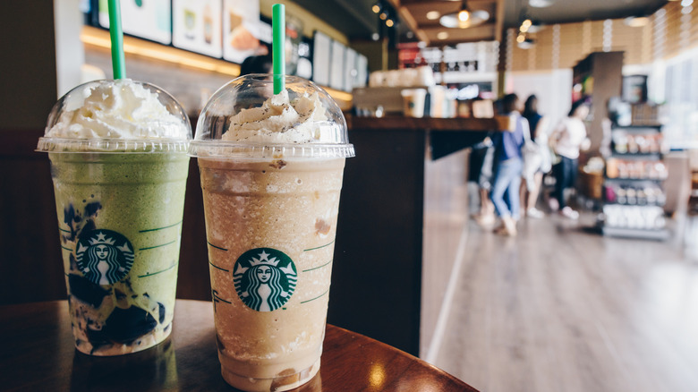 Starbucks coffee in the foreground