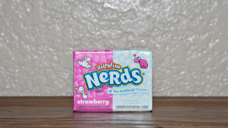 Box of Nerds on a table against an off-white wall