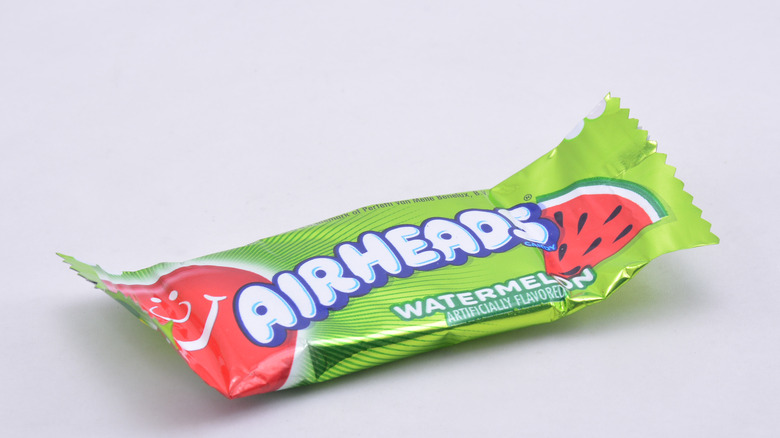 A piece of watermelon-flavored Airhead candy 