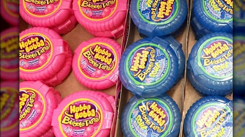 Pink and blue containers of Bubble Tape 