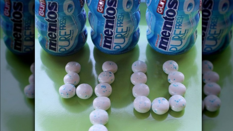 Boxes of Mentos in a row 