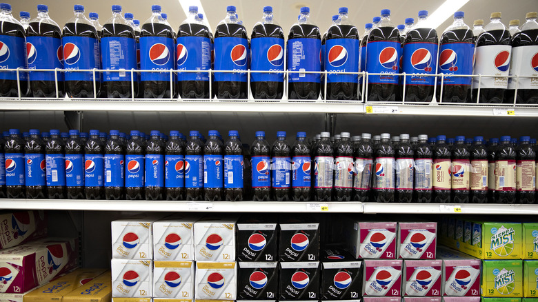 Soda on shelves in grocery store 