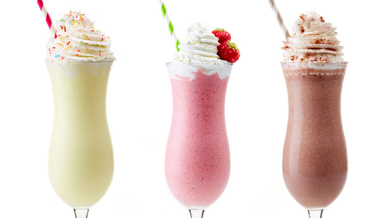 Strawberry, vanilla, and chocolate milkshakes 