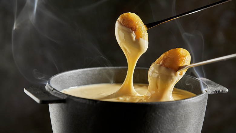 potatoes dipped in fondue