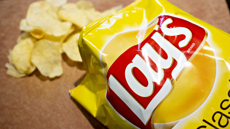 open yellow bag of lays