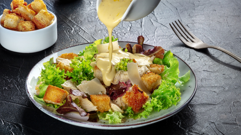 salad dressing being poured