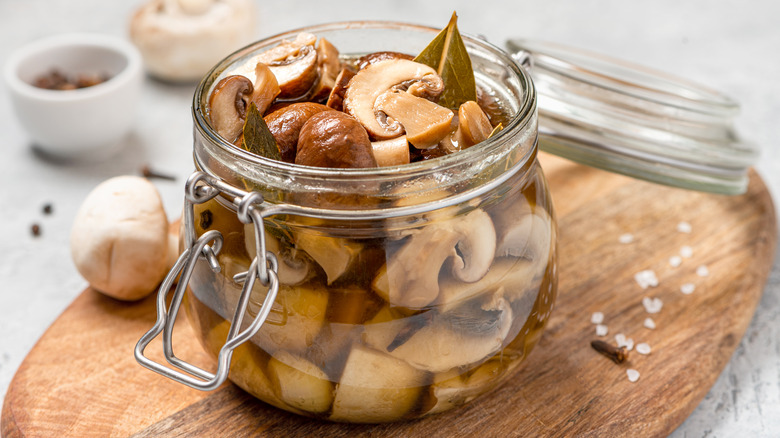 jar of marinated mushrooms