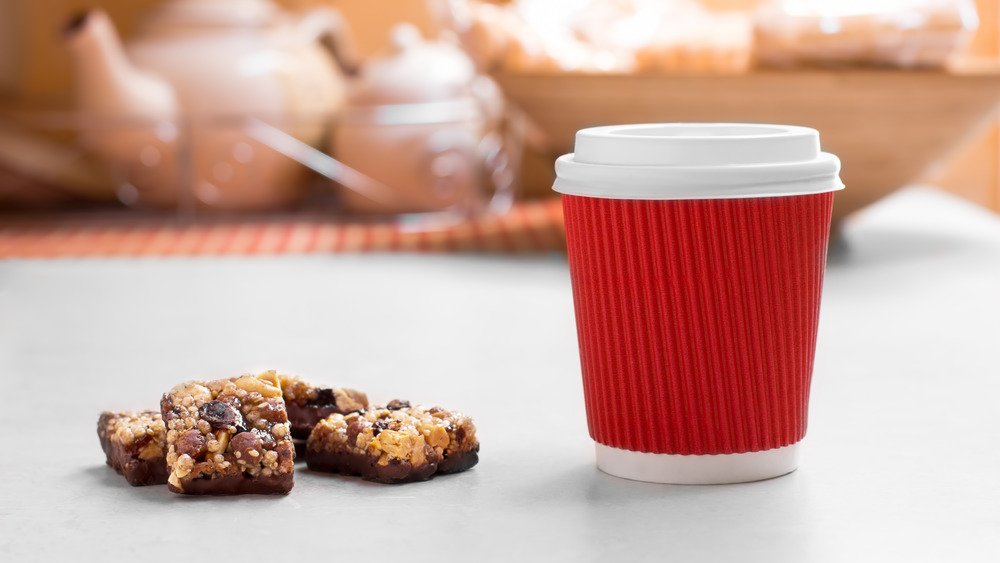 Small red beverage cup with holiday treats