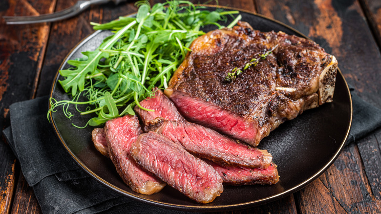 Steak and greens on plate