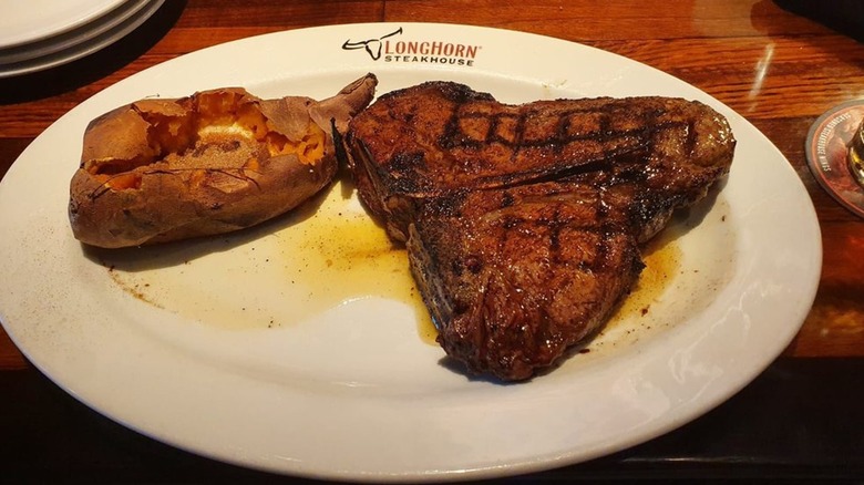 Longhorn Steakhouse porterhouse and baked potato