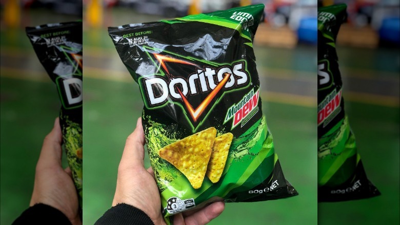 mountain dew doritos in hand