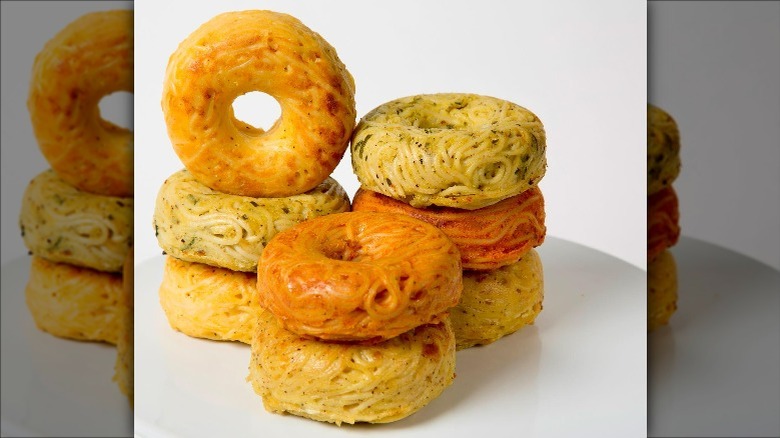 pile of assorted spaghetti donuts