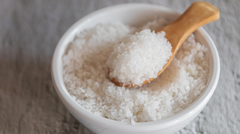 bowl of fleur de sel with wooden spoon