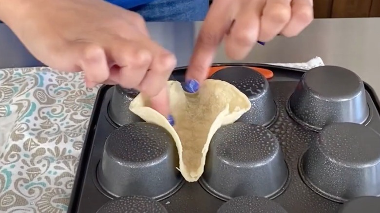 Tortilla pressed into muffin tin