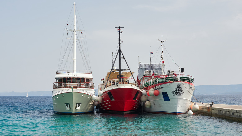 Three boats in port