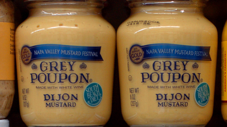 Close up of jars of Grey Poupon Mustard