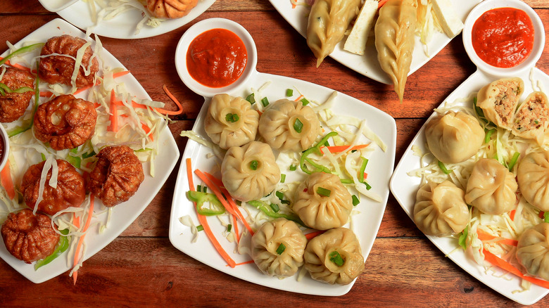 Nepali momo dumplings with sauces