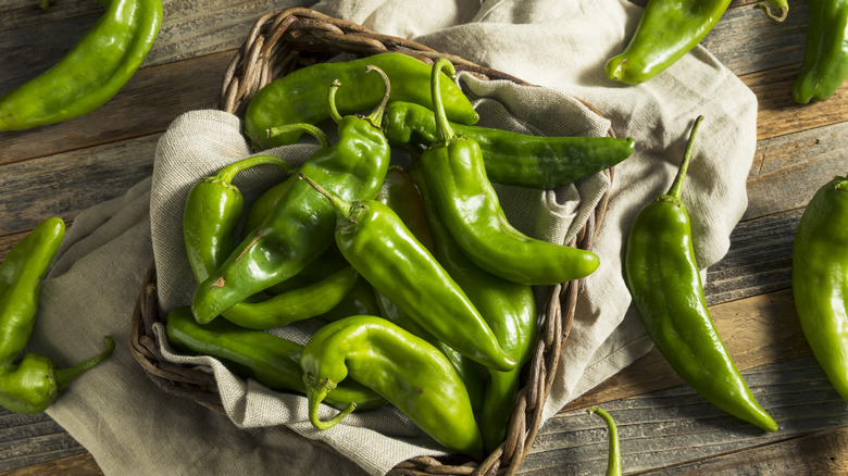 Hatch green chilis in basket 