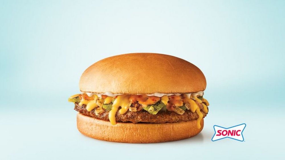 the new Sonic queso burger on a blue background