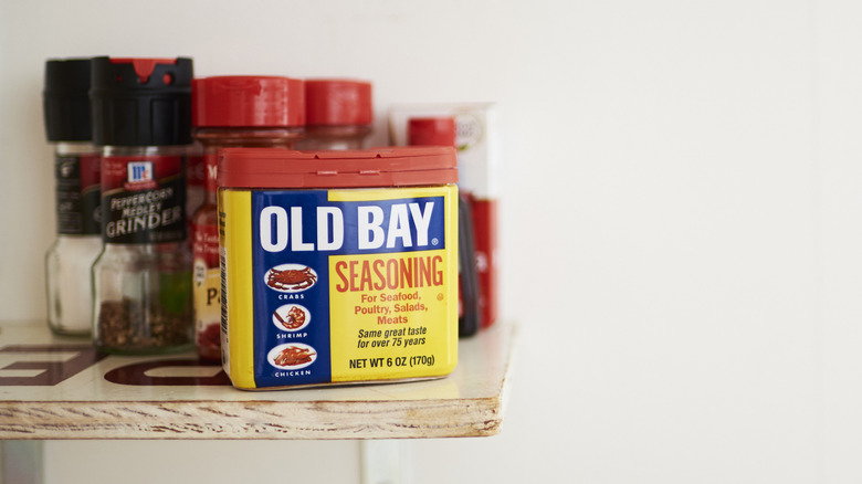 Old bay and other spices on a shelf