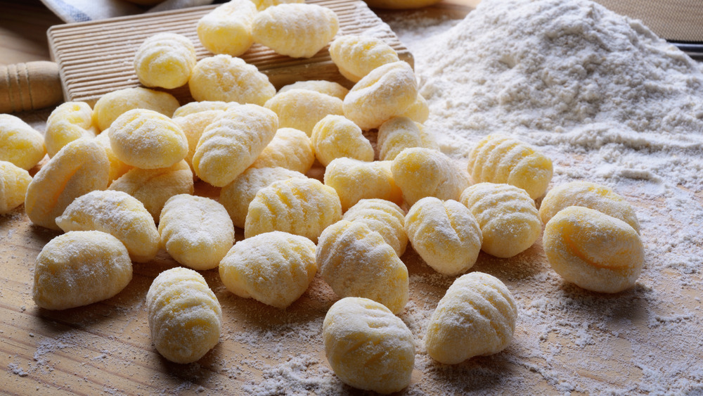 Gnocchi on a floured cutting board