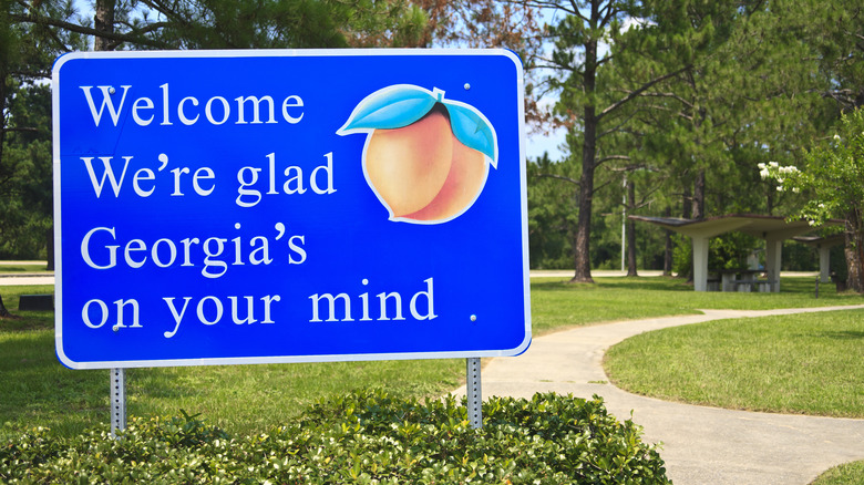 Georgia welcome sign with peach