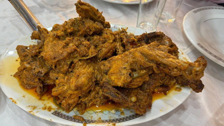 biye barir  on white plate