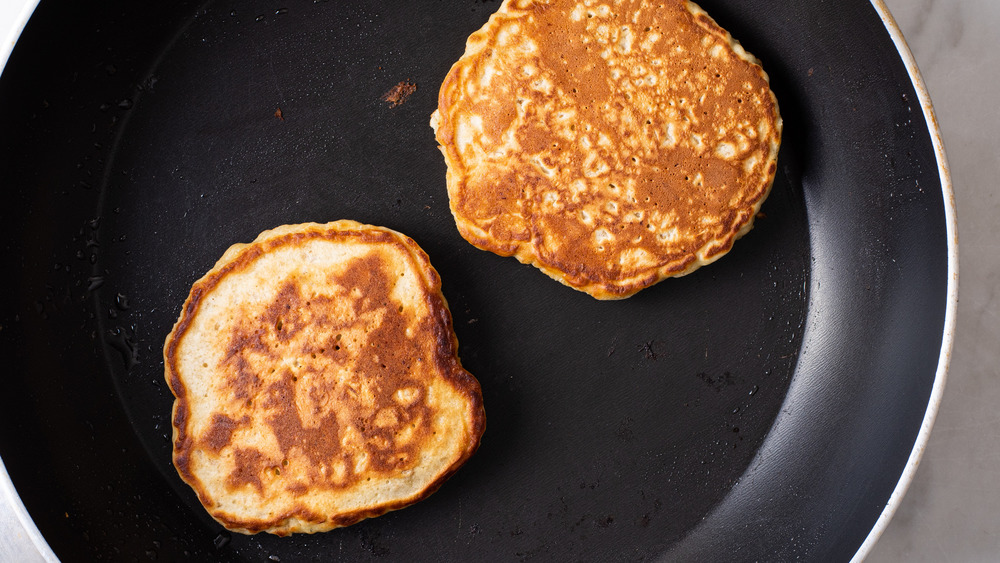 Oatmeal pancakes in a non-stick skillet