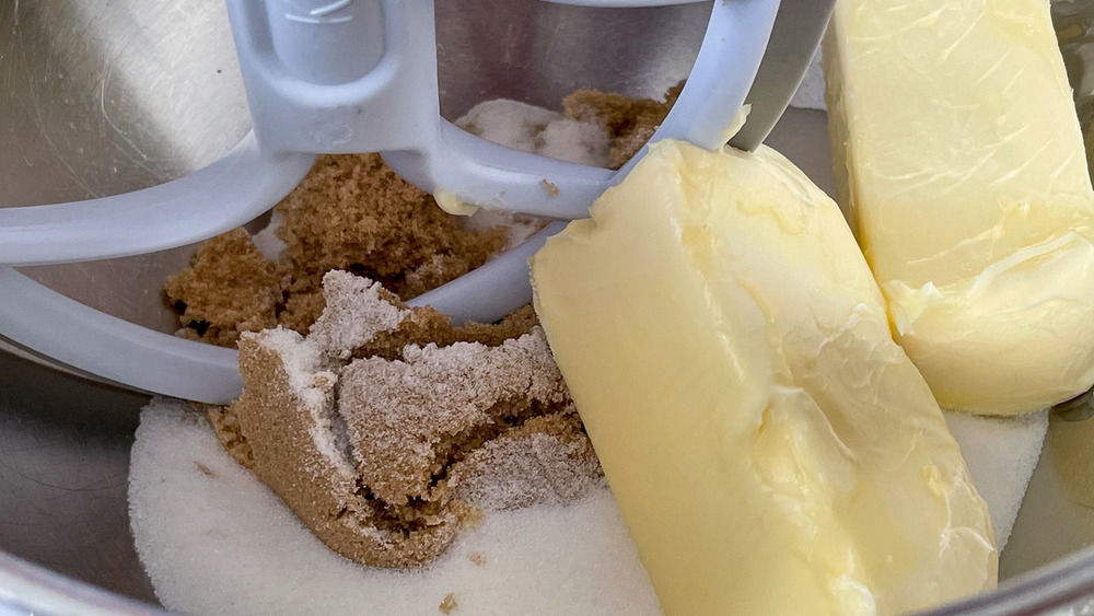 mixing ingredients for oatmeal raisin cookies