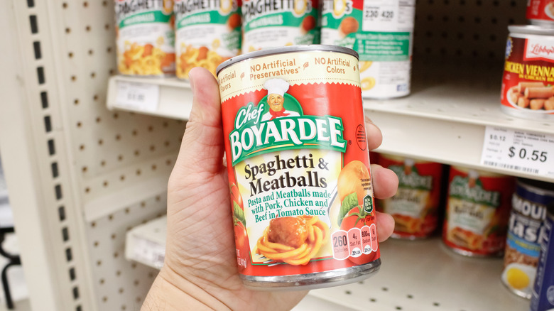 hand holding chef boyardee