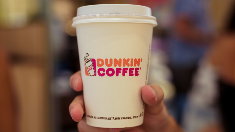 A Dunkin' coffee cup