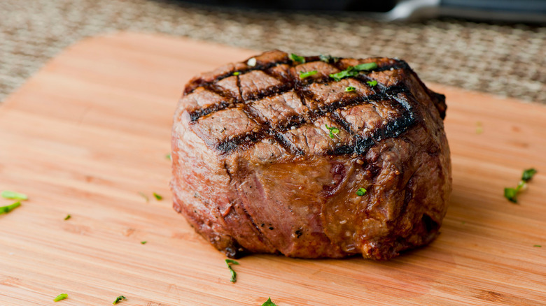 Filet Mignon on wooden board