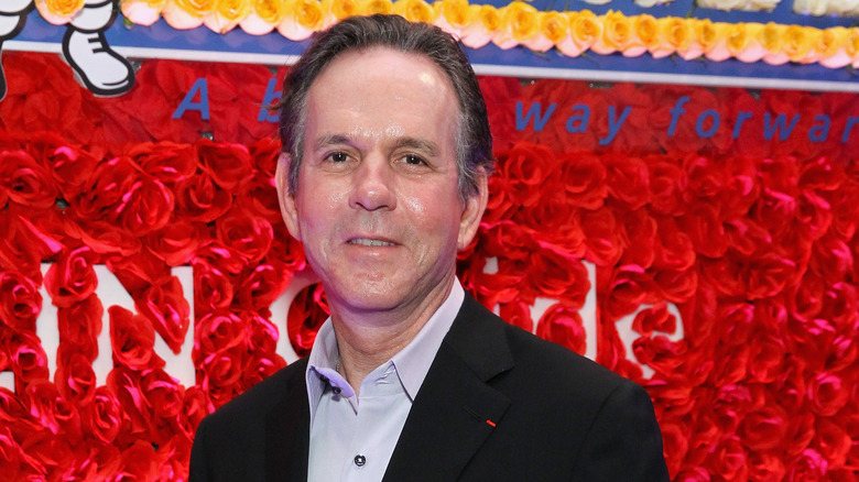 Thomas Keller in a black coat