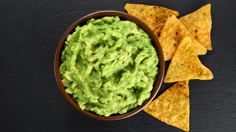 Chips and a bowl of guacamole