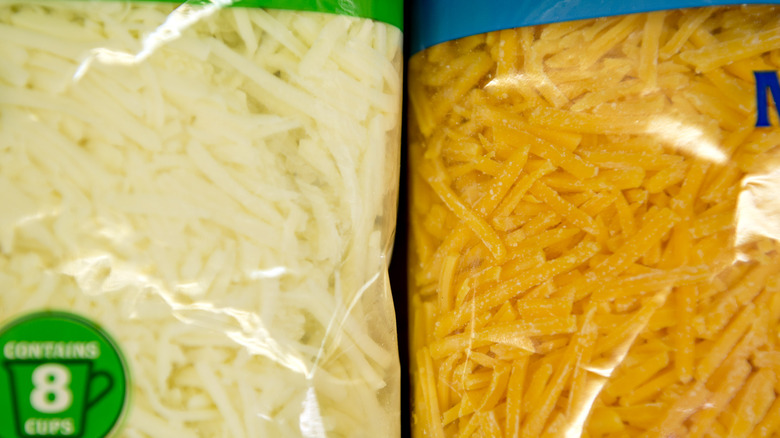 Packages of shredded cheese